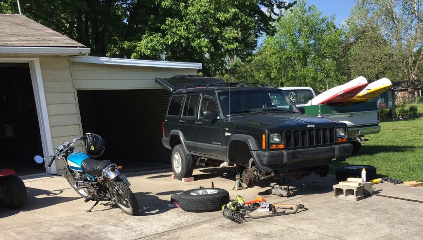 working on a jeep charokee xj lift kit install