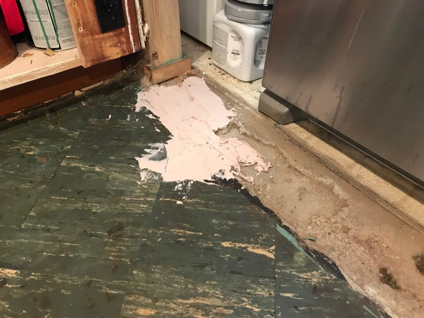 kitchen floor replacement DIY filling holes with bondo