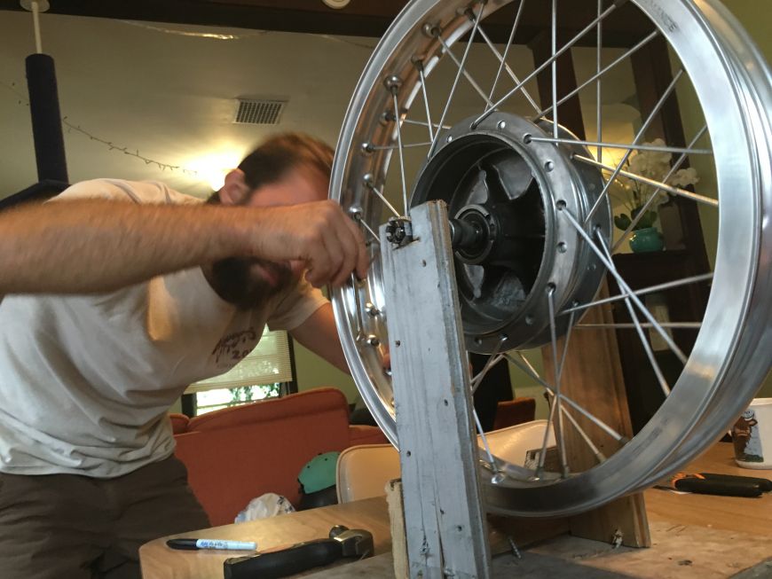 trueing motorcycle rims spokes on a homemade, DIY truing stand